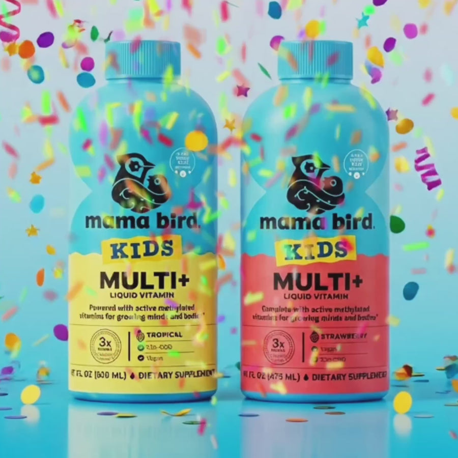 Kids liquid multi bottles side by side with colorful confetti from above